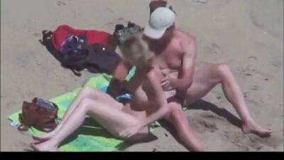 Beautiful blonde gets groped on a nude beach - sunporno.com